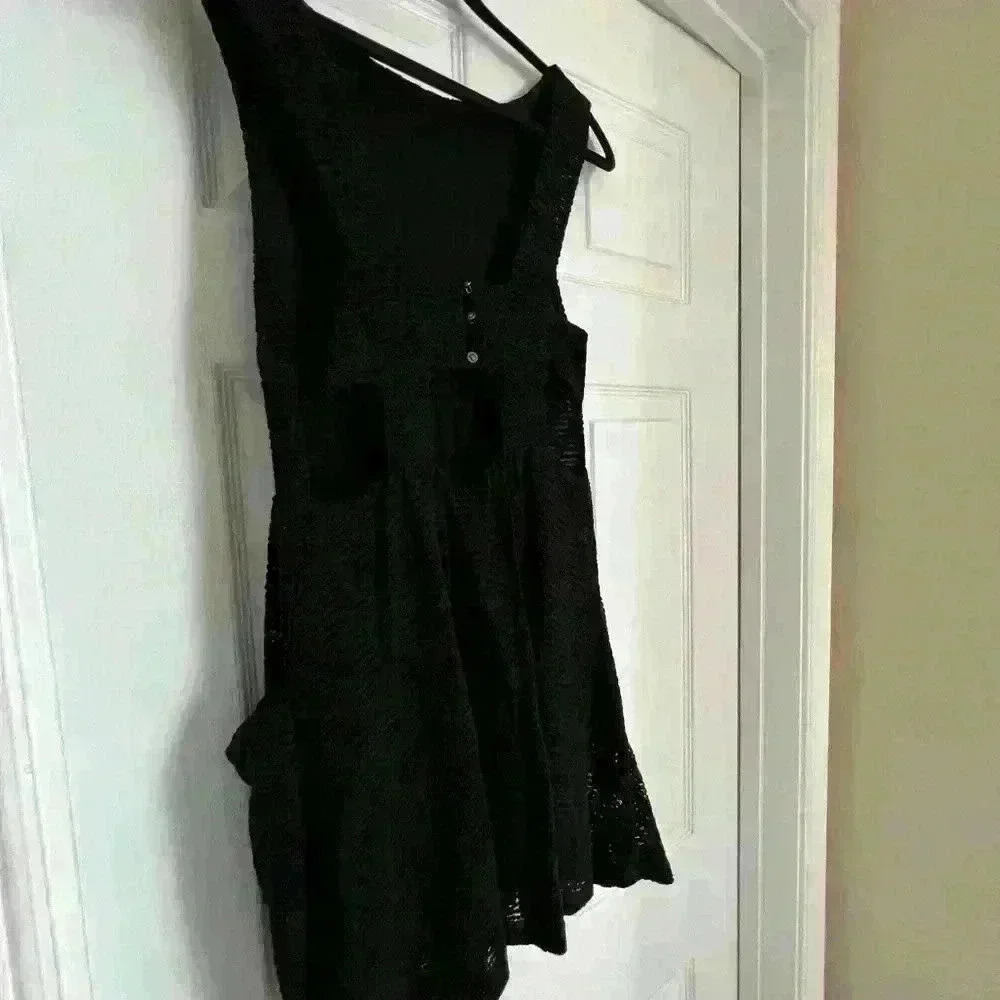 Free people black dress with cutout on the side and in the back. Size is XS/S. - Picture 3 of 12